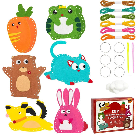 Set of animal-shaped craft materials with sewing tools on a white background