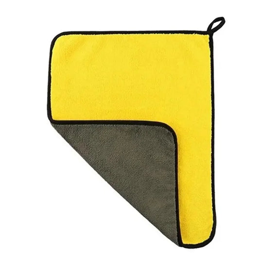 Yellow and gray microfiber cleaning cloth on a white background
